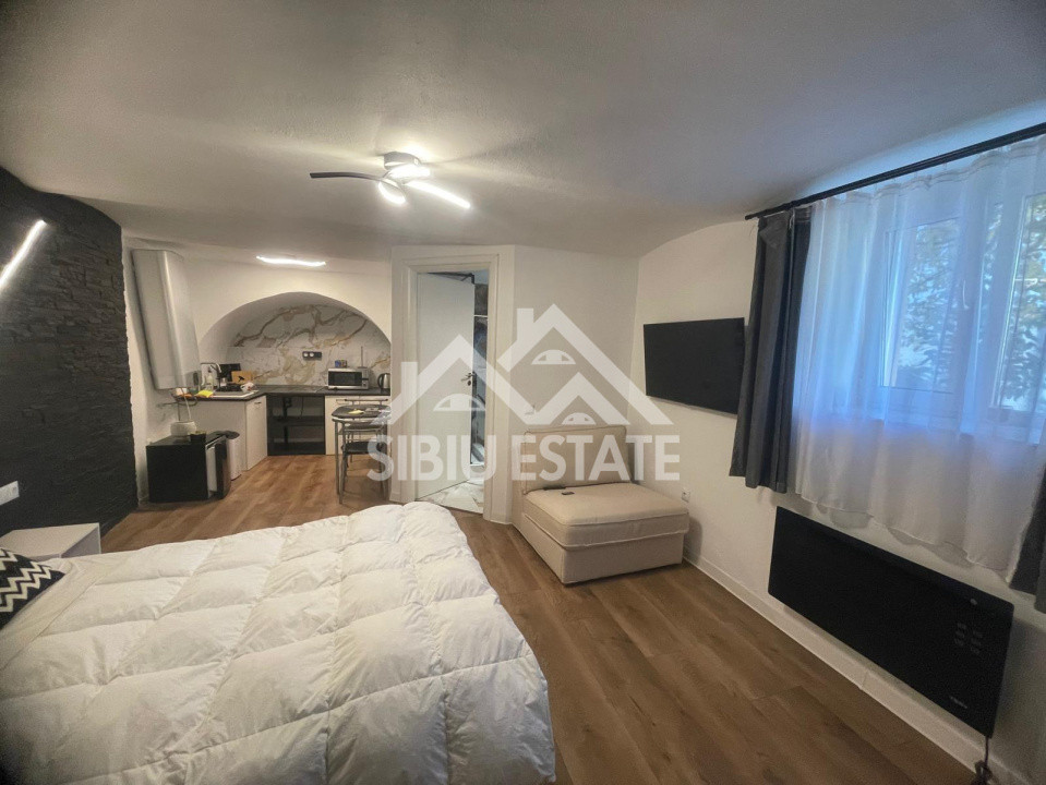 Garsonieră modernă, de vanzare, ultracentral–ideală pentru locuit sau investitie