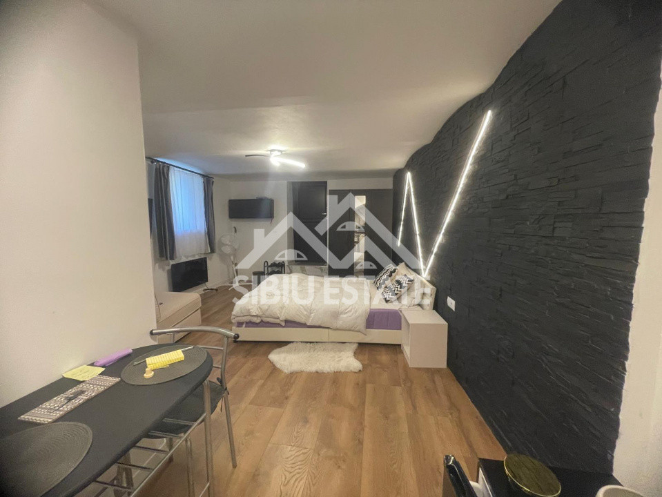 Garsonieră modernă, de vanzare, ultracentral–ideală pentru locuit sau investitie