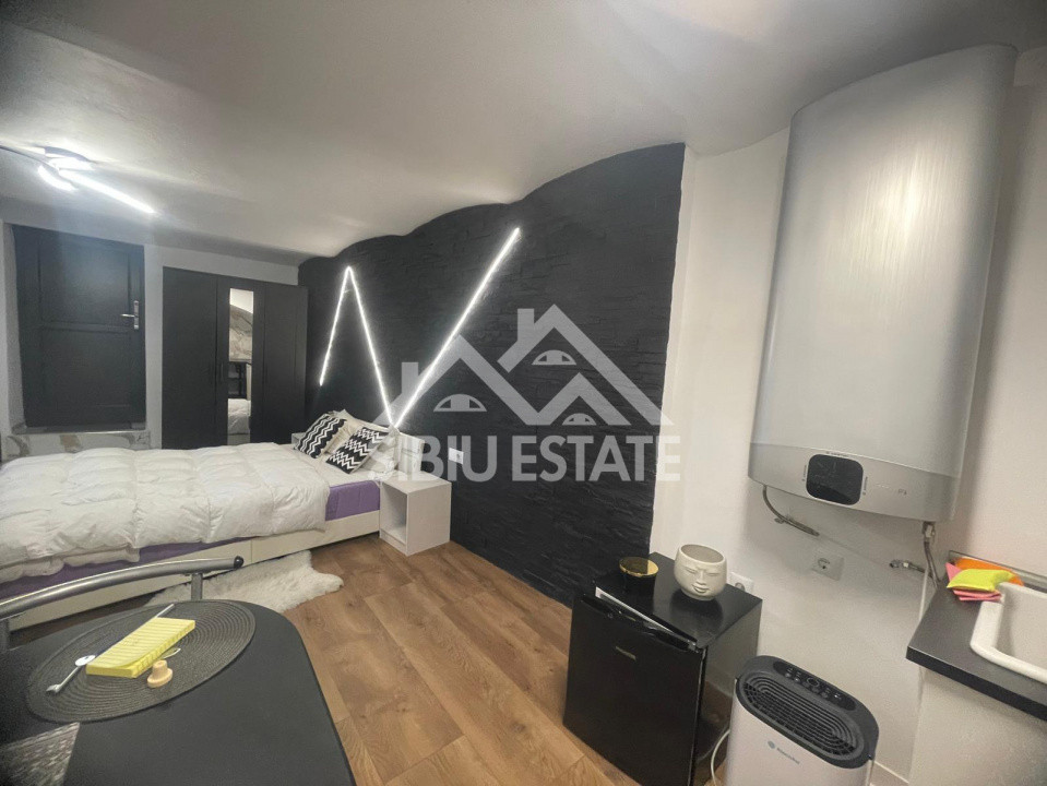 Garsonieră modernă, de vanzare, ultracentral–ideală pentru locuit sau investitie