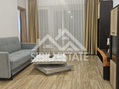 Apartament de inchiriat cu  3 camere,balcon, loc de parcarare, mobilat si utilat