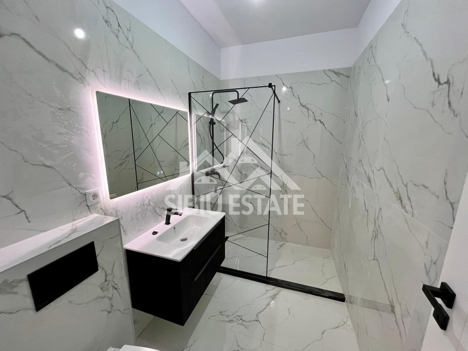 Apartament cu 3 camere, 2 bai, boxa 20 mp. loc de parcare -Finisat la cheie