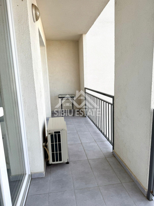 Apartament de inchiriat cu 2 camere, balcon, loc de parcare-mobilat si utilat