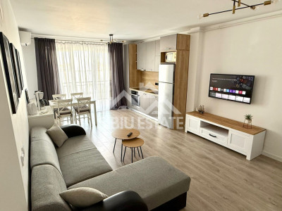 Apartament de inchiriat cu 2 camere, balcon, loc de parcare-mobilat si utilat