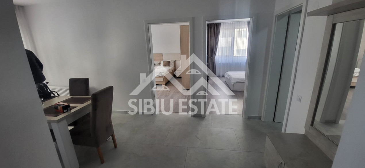 Apartament de inchiriat cu 2 camere, balcon, loc de parcare-mobilat si utilat