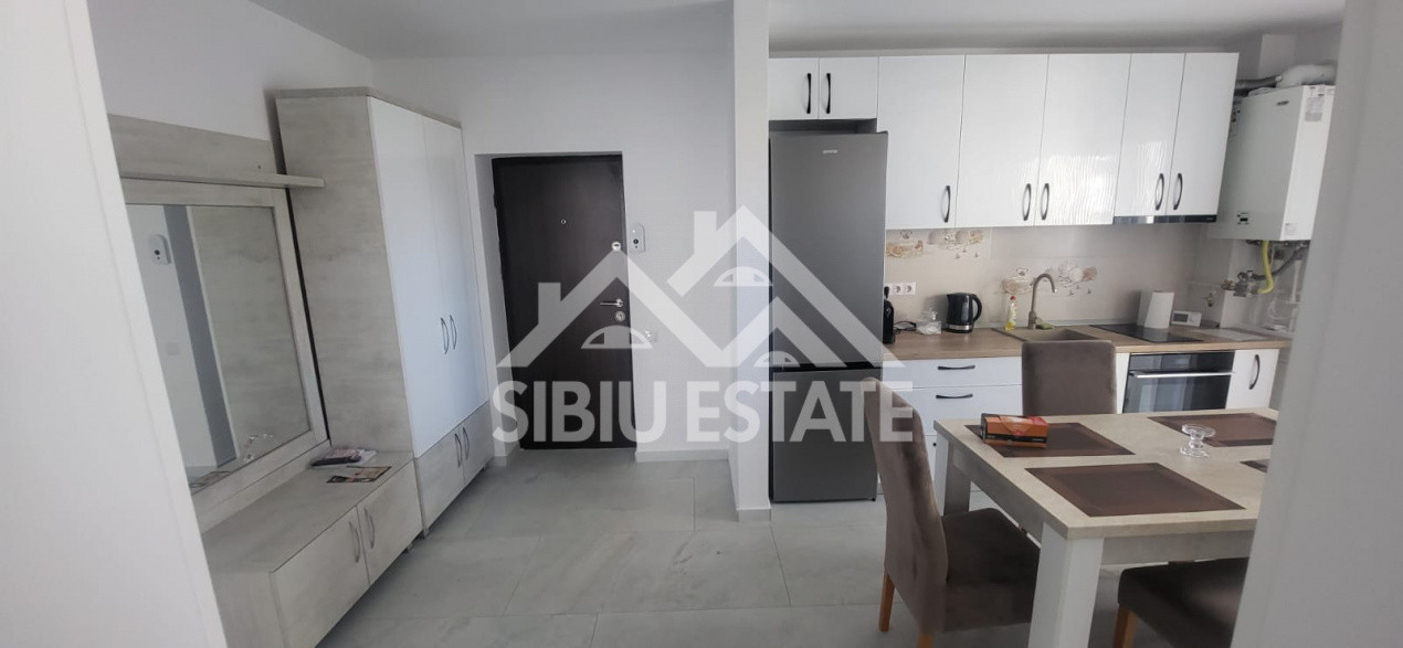 Apartament de inchiriat cu 2 camere, balcon, loc de parcare-mobilat si utilat