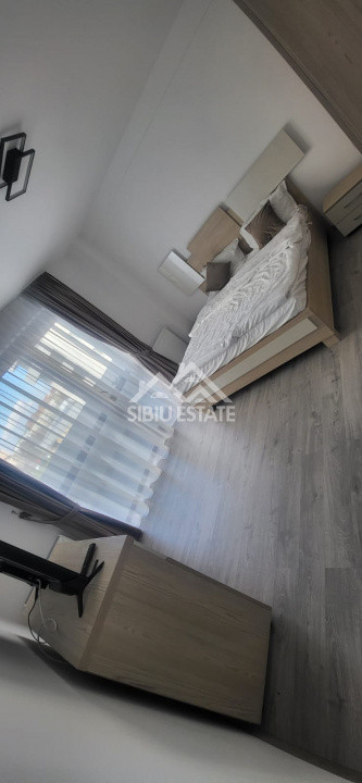 Apartament de inchiriat cu 2 camere, balcon, loc de parcare-mobilat si utilat