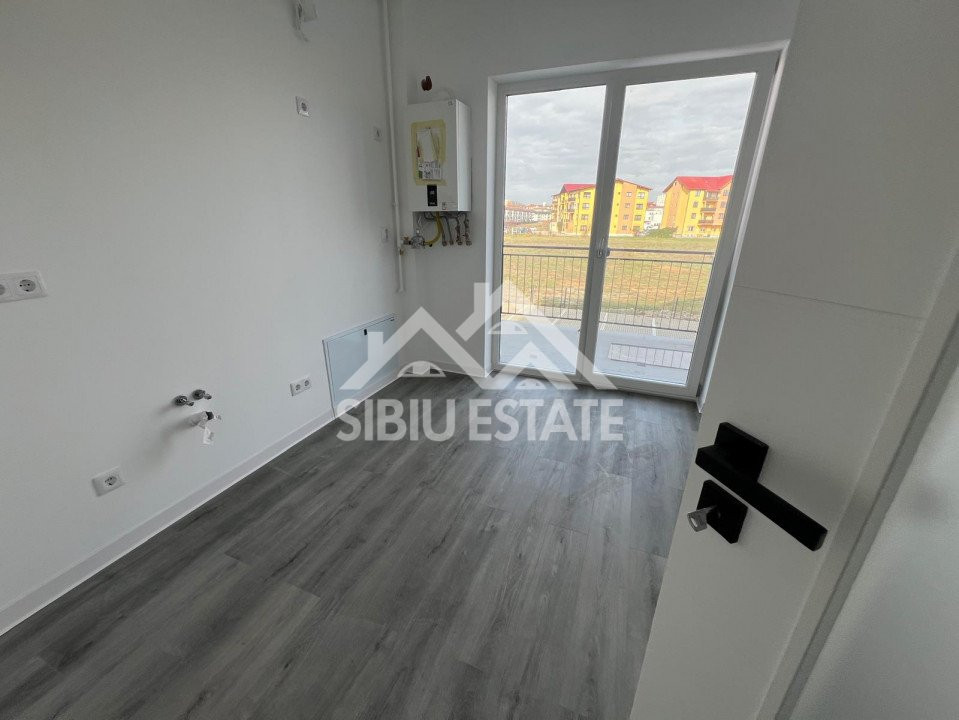 Apartament modern cu 2 camere, bucătărie închisă și balcon 