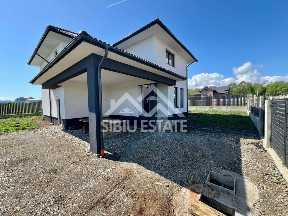 Casa individuala generoasa 5 camere, carport si pivnita curte 500 mp 