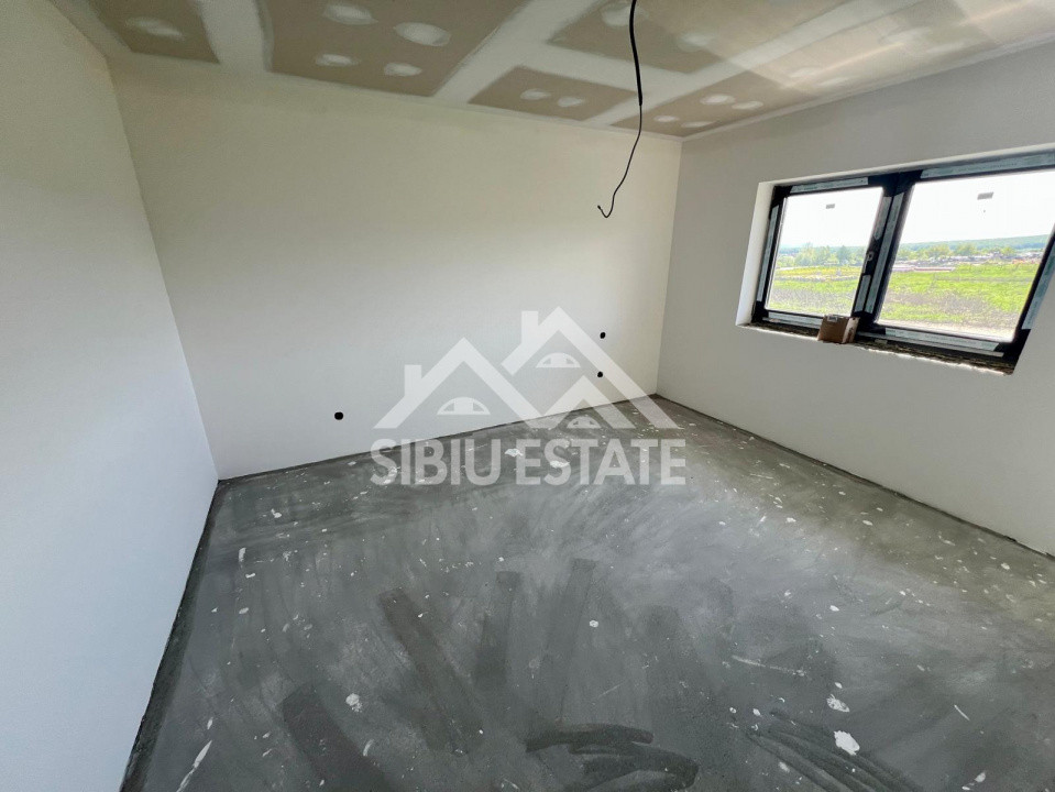 Casa individuala generoasa 5 camere, carport si pivnita curte 500 mp 