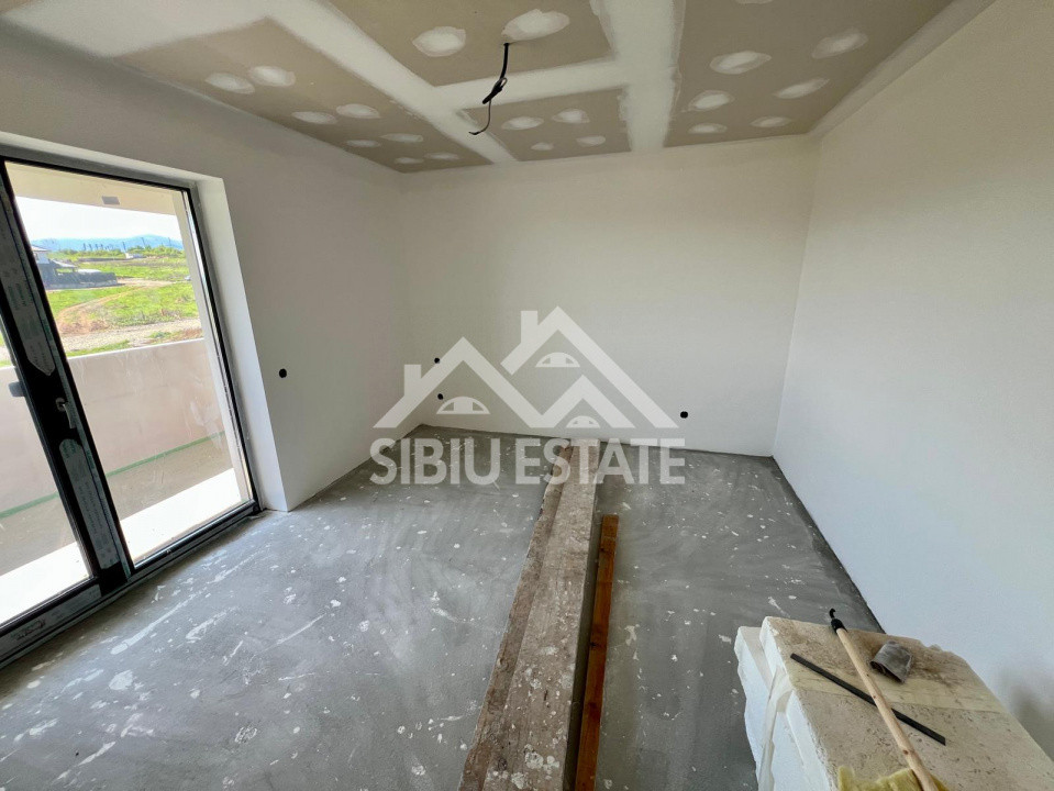 Casa individuala generoasa 5 camere, carport si pivnita curte 500 mp 