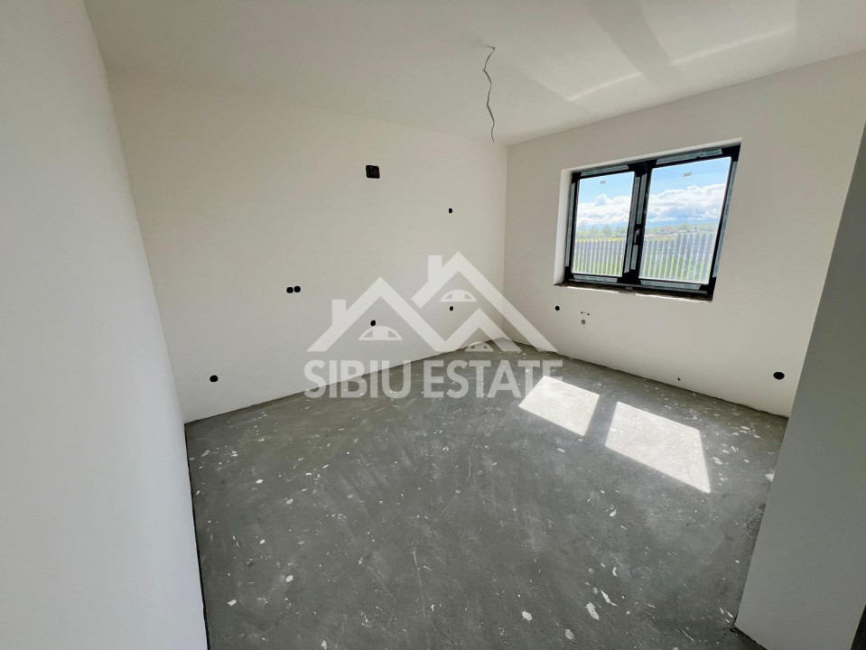Casa individuala generoasa 5 camere, carport si pivnita curte 500 mp 