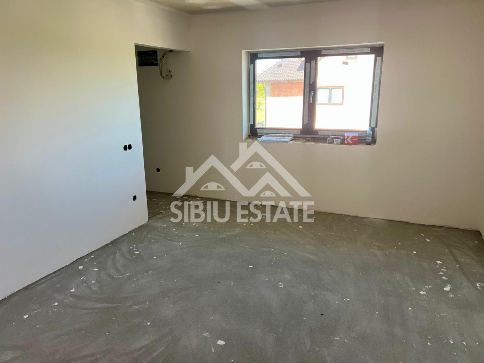 Casa individuala generoasa 5 camere, carport si pivnita curte 500 mp 