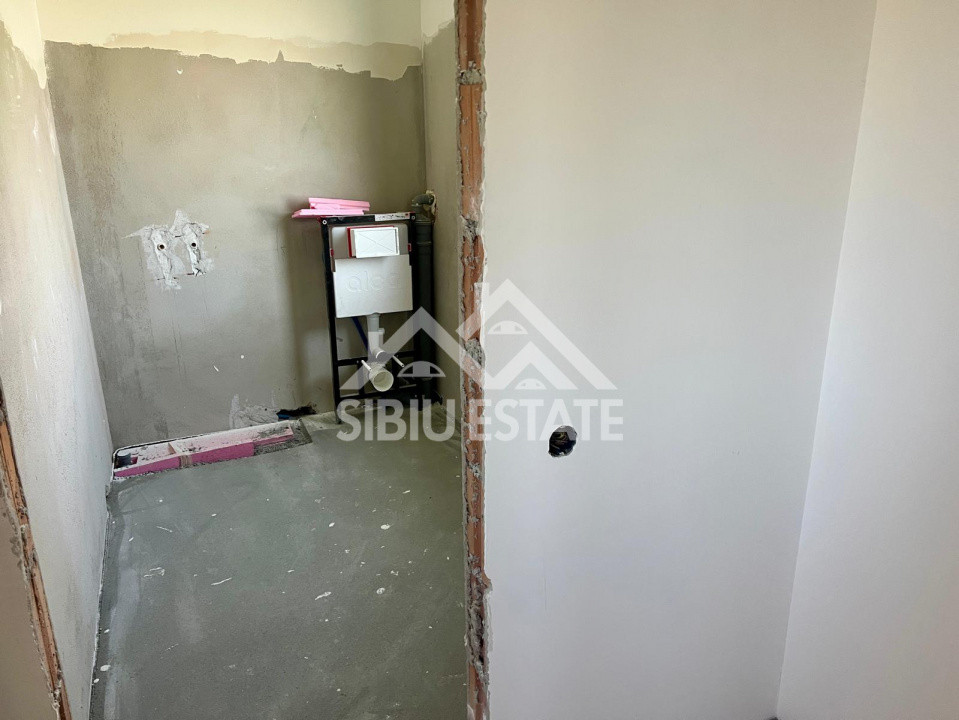 Casa individuala generoasa 5 camere, carport si pivnita curte 500 mp 